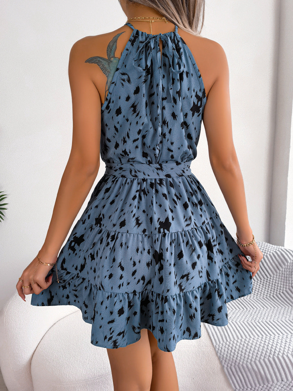 Chic leopard print ruffled swing dress, perfect for summer beach vibes!